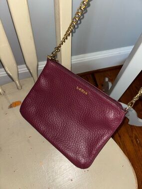Lodis Pebbled Leather Crossbody in Wine with Gold Chain